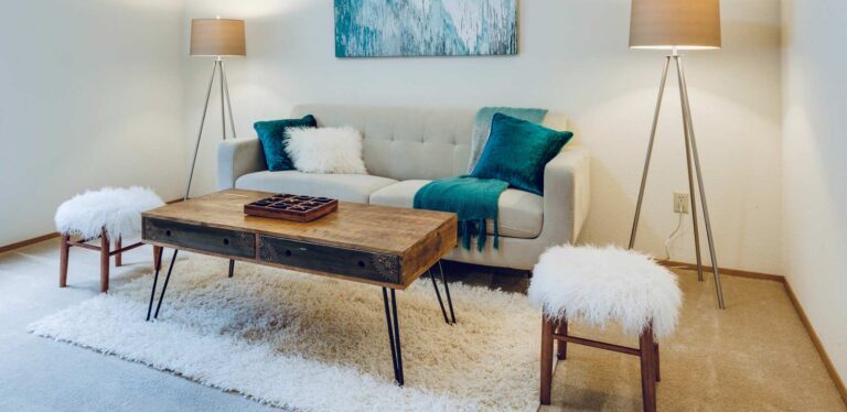 Modern living room with cozy furniture and decorative accents.